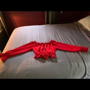 Off the shoulder red ruffle blouse w/ middle part